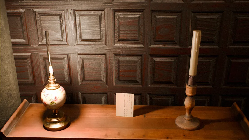 The hall table: a lamp, a candle and a folded note